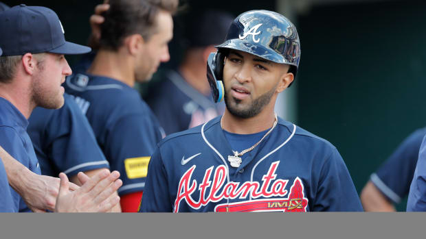 Jun 14, 2023; Detroit, Michigan, USA; Atlanta Braves left fielder Eddie Rosario (8) celebrates with teammates after scoring against the Detroit Tigers in the fourth inning at Comerica Park.